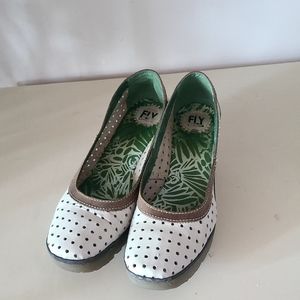 Fly London leather wedge shoes.